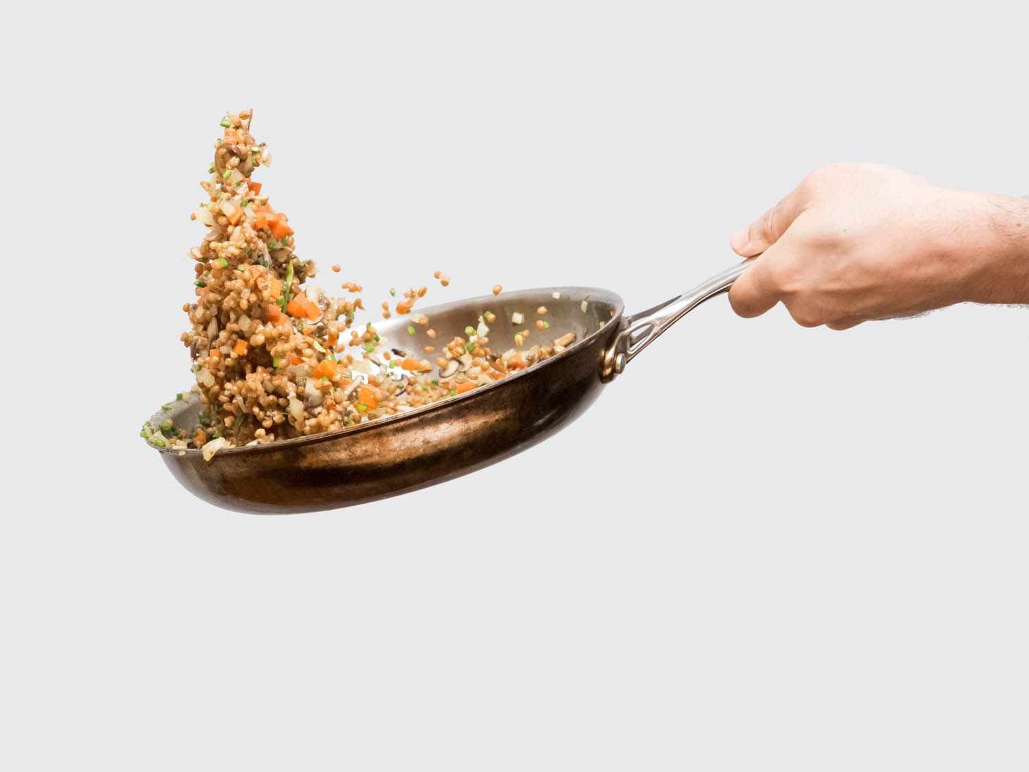 How to Toss Food in a Skillet