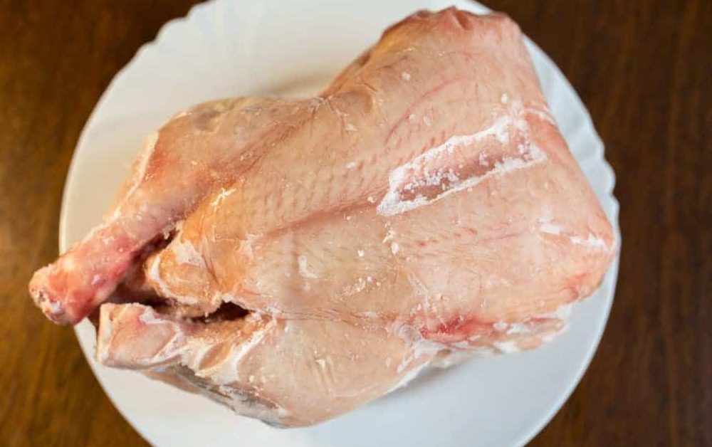 can you defrost chicken in hot water