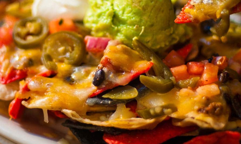 How to Reheat Nachos with Toppings